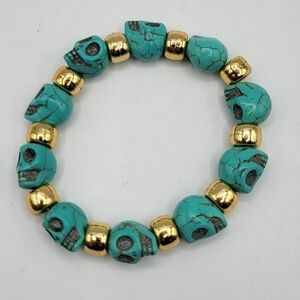 Turquoise skull & gold bead bracelet